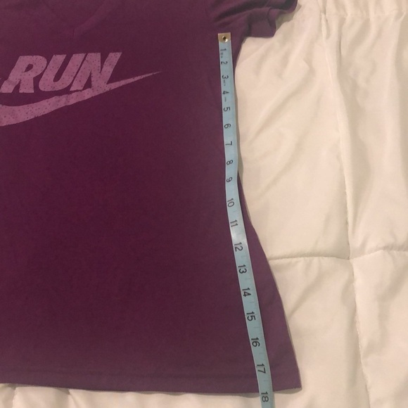 Nike running Dri-Fit T-shirt short sleeve in purple with Run saying and swoosh - Picture 6 of 7